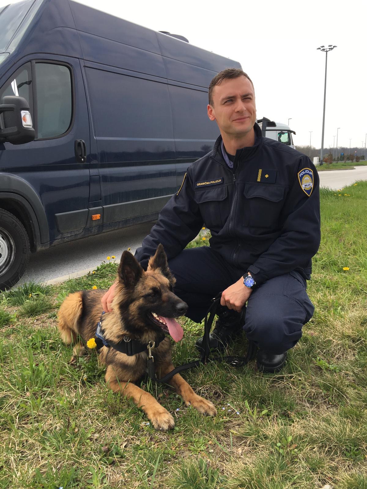 Aleksandar Kovac with a dog in 2019